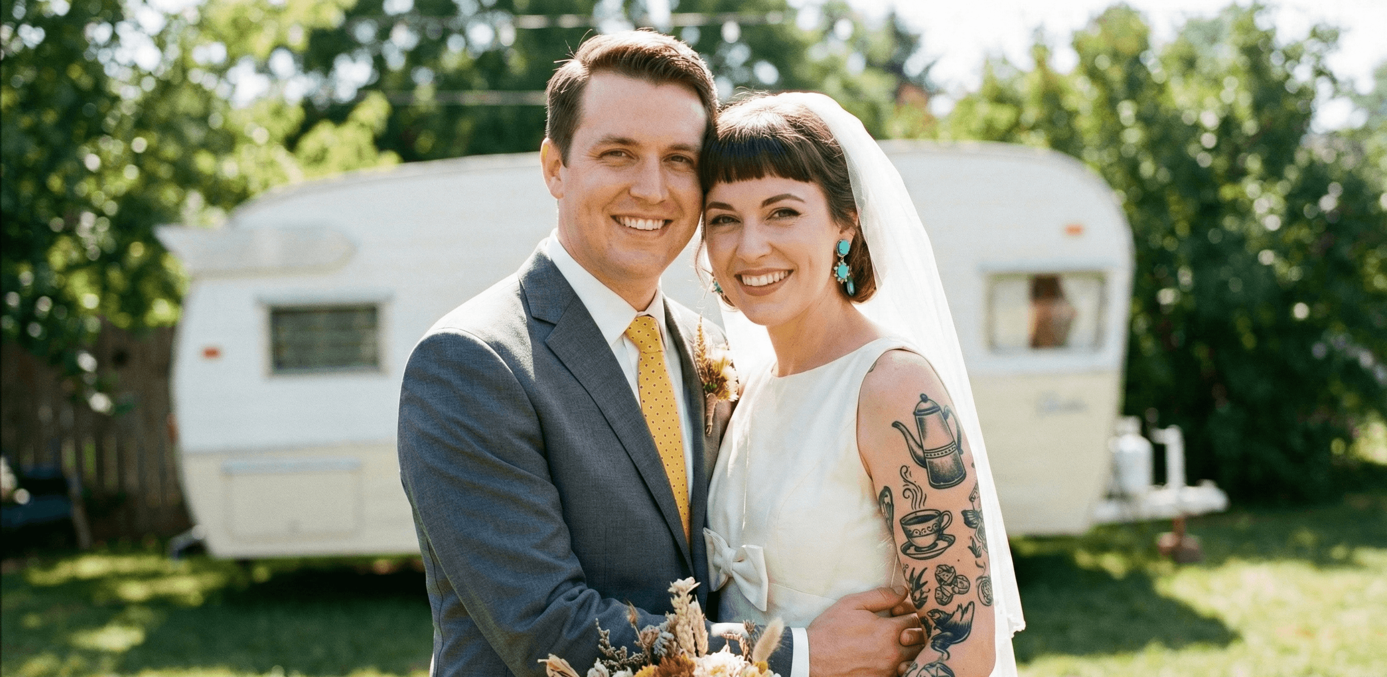 Two newlyweds posing.