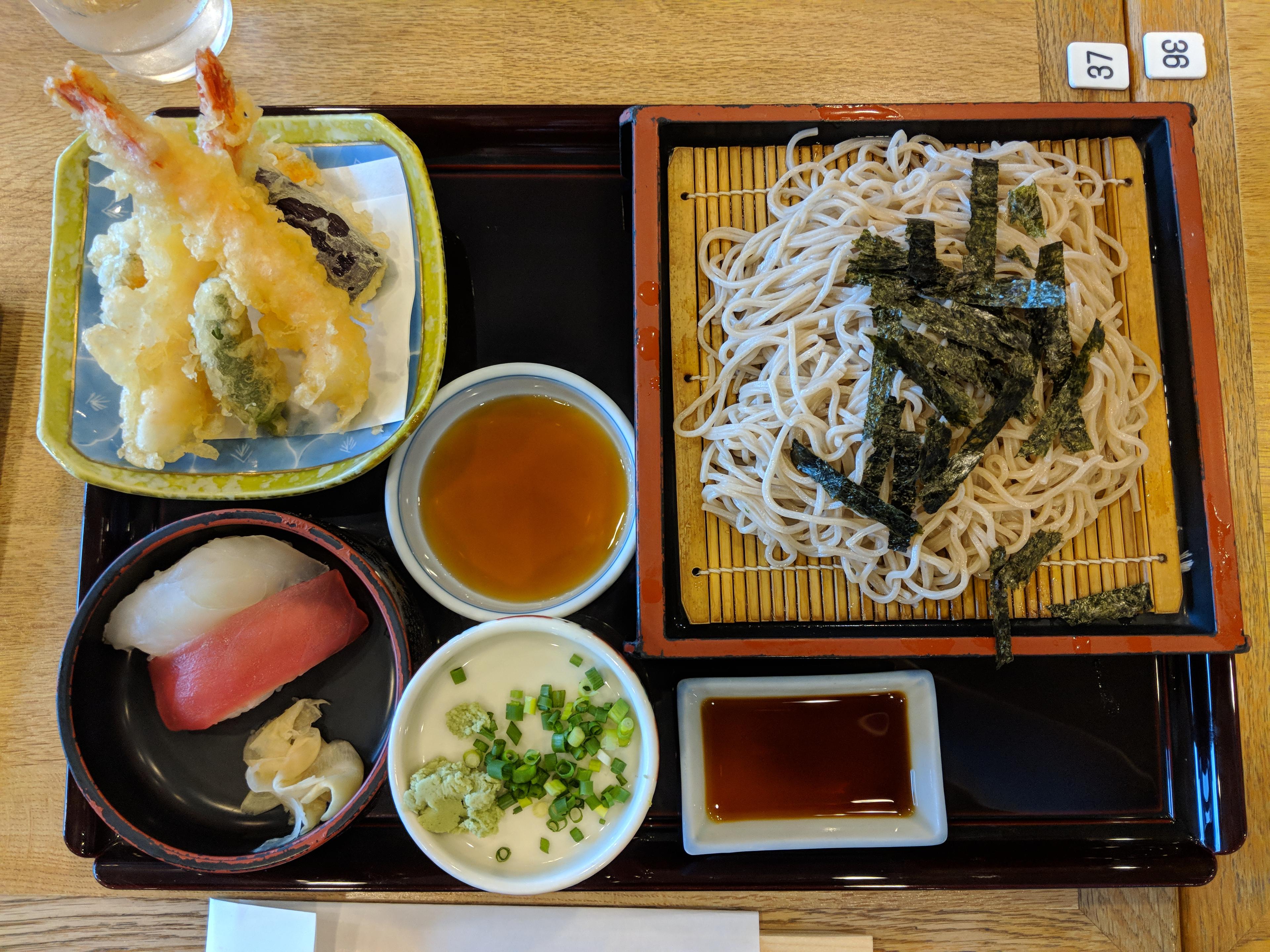 A tray of Japanese food.