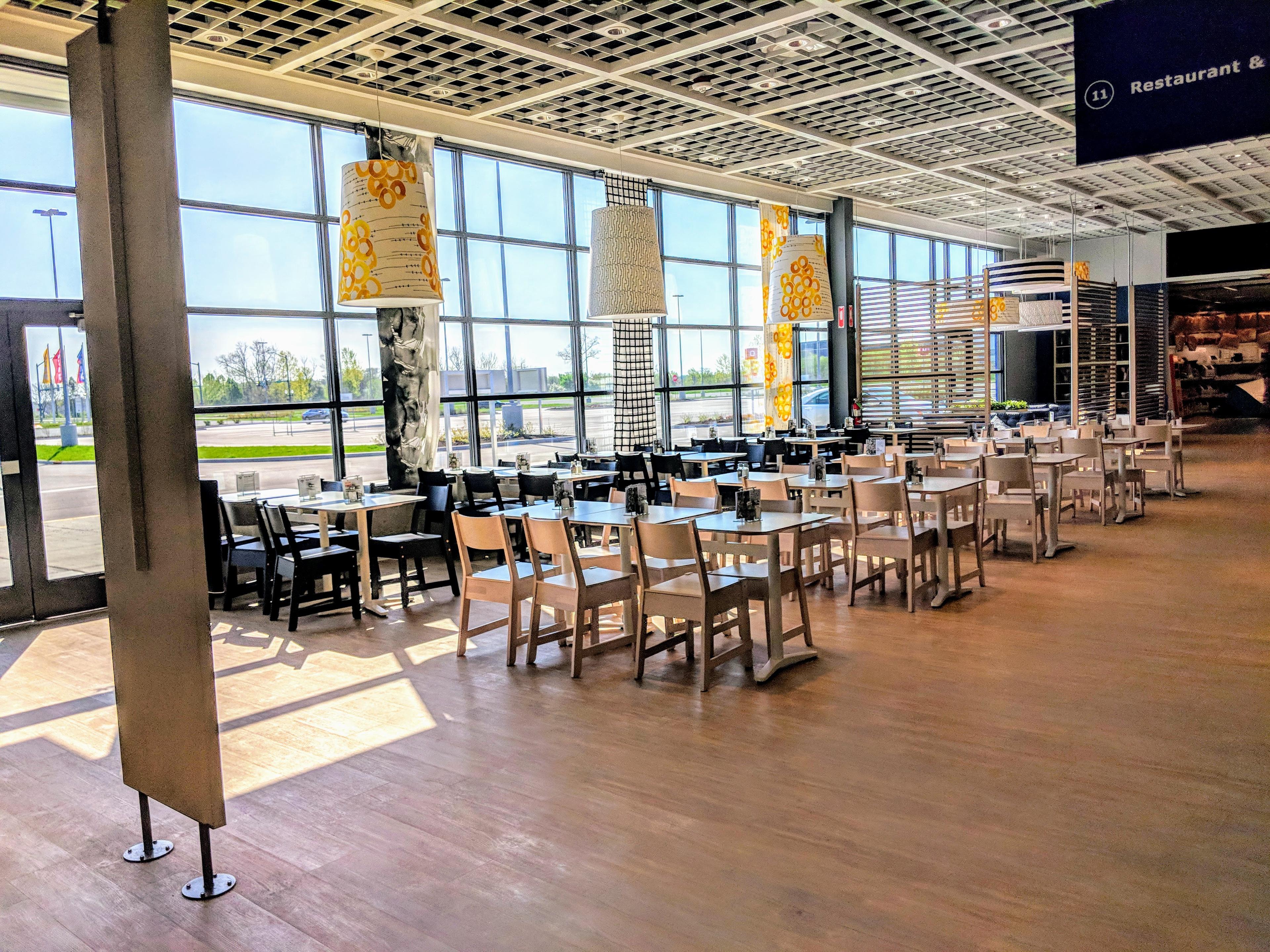 A large indoor food court without people.